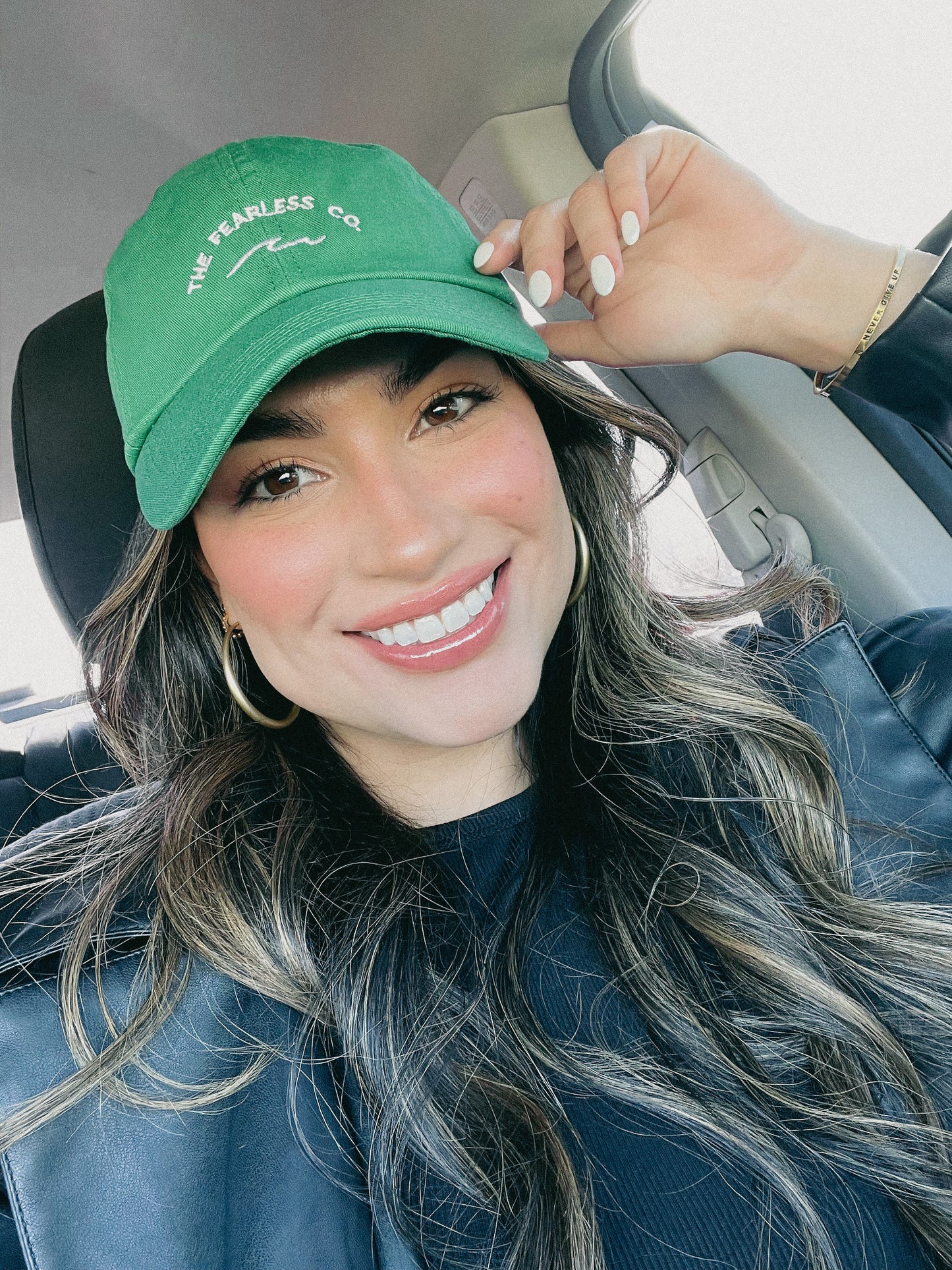 unstructured dad hat in the color kelly green. 100% cotton. Waves logo. waves. the fearless co.