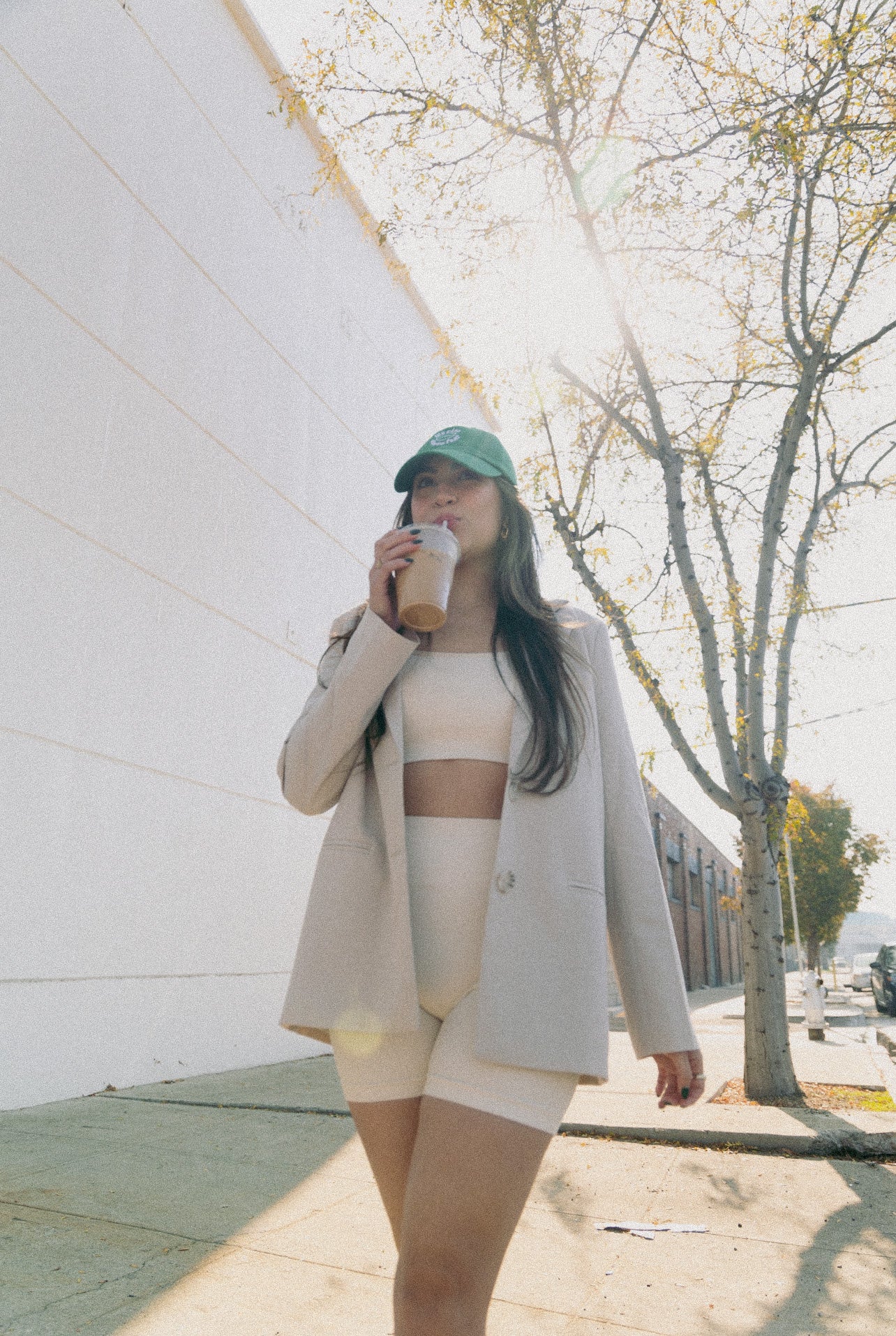unstructured dad hat in the color kelly green. waves. We rise above fear logo. the fearless co. 100% cotton.